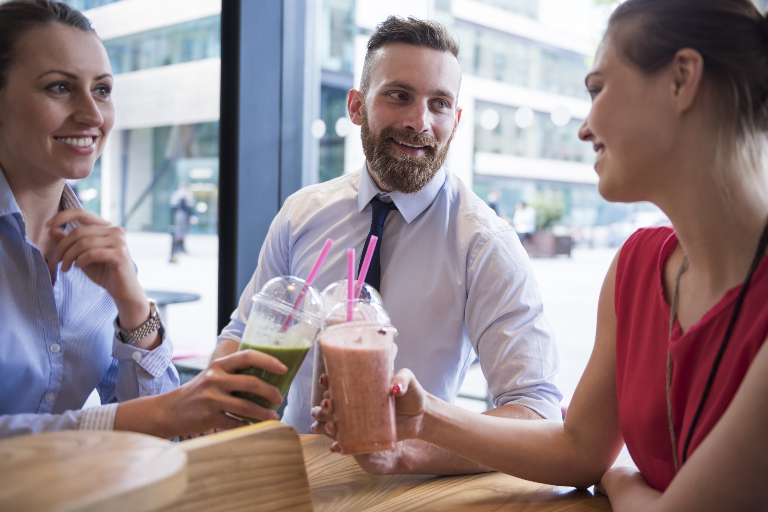 Refreshing fruit smoothie served from vending machine during office lunch break